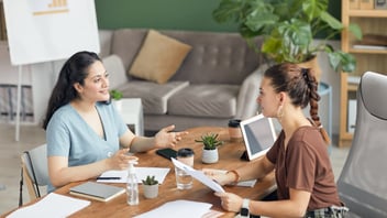 two woman doing an interview 