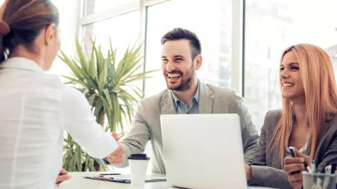 People shaking hands at a job interview