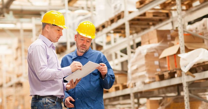 2 men working in a warehouse